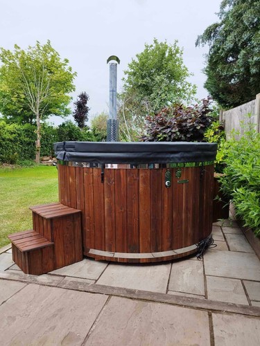 Integrated wood fired heater