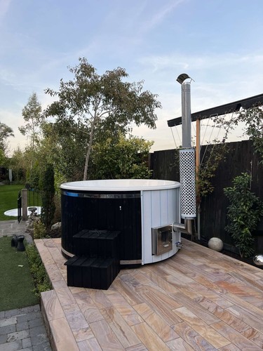 Wood fired hot - tub, with